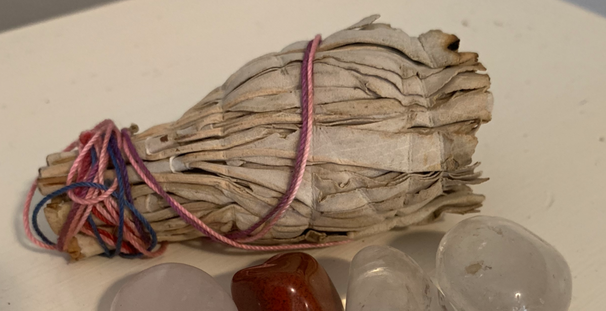 Clear negative energies with a white sage smudge stick